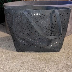 Bath and Body Works gray laser cut zipper closure bag